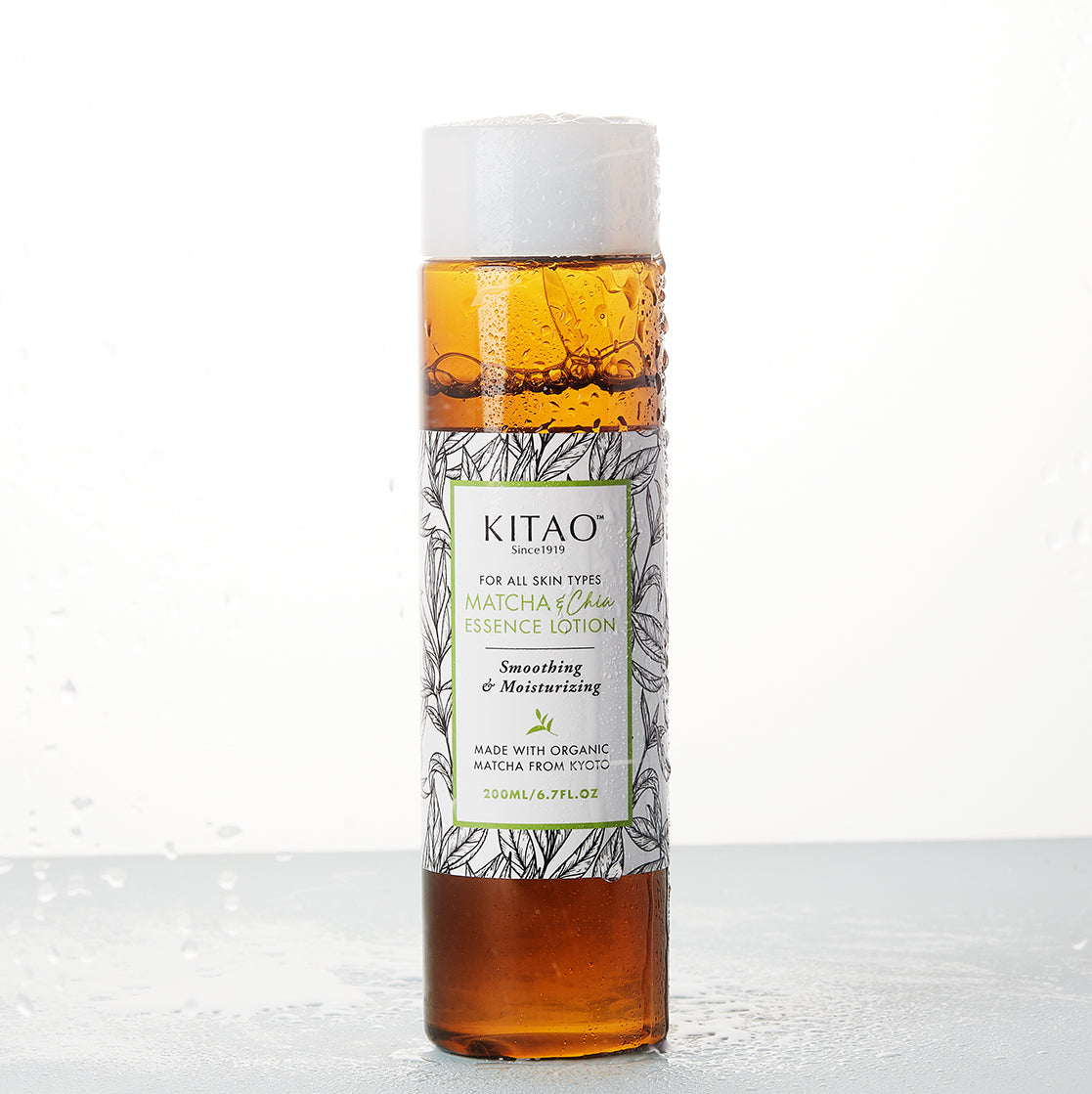 Kitao Matcha Essence Lotion with water droplets